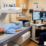 patient undergoing a DEXA scan for bone density measurement - bone density medication