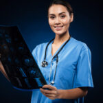 Patient reviewing shoulder MRI scan with orthopedic specialist